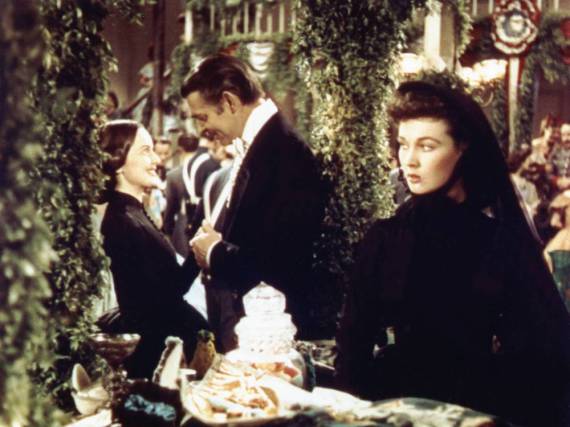 Vivien Leigh (li.), Clark Gable und Olivia de Havilland in