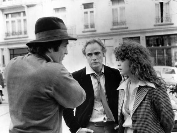 Bernardo Bertolucci (l.) mit Marlon Brando und Maria Schneider bei den Dreharbeiten von